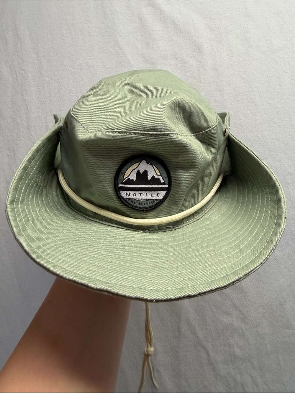 Notice the reckless mountain bucket hat
Snap brim drawstring